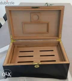 humidor, barely used still in box , up to 150 cigar