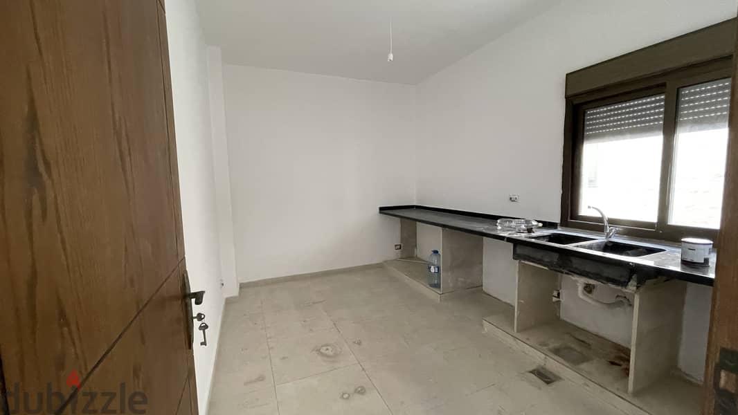 RWB125CA - Apartment for Sale in Amchit Jbeil شقة للبيع في عمشيت جبيل 4