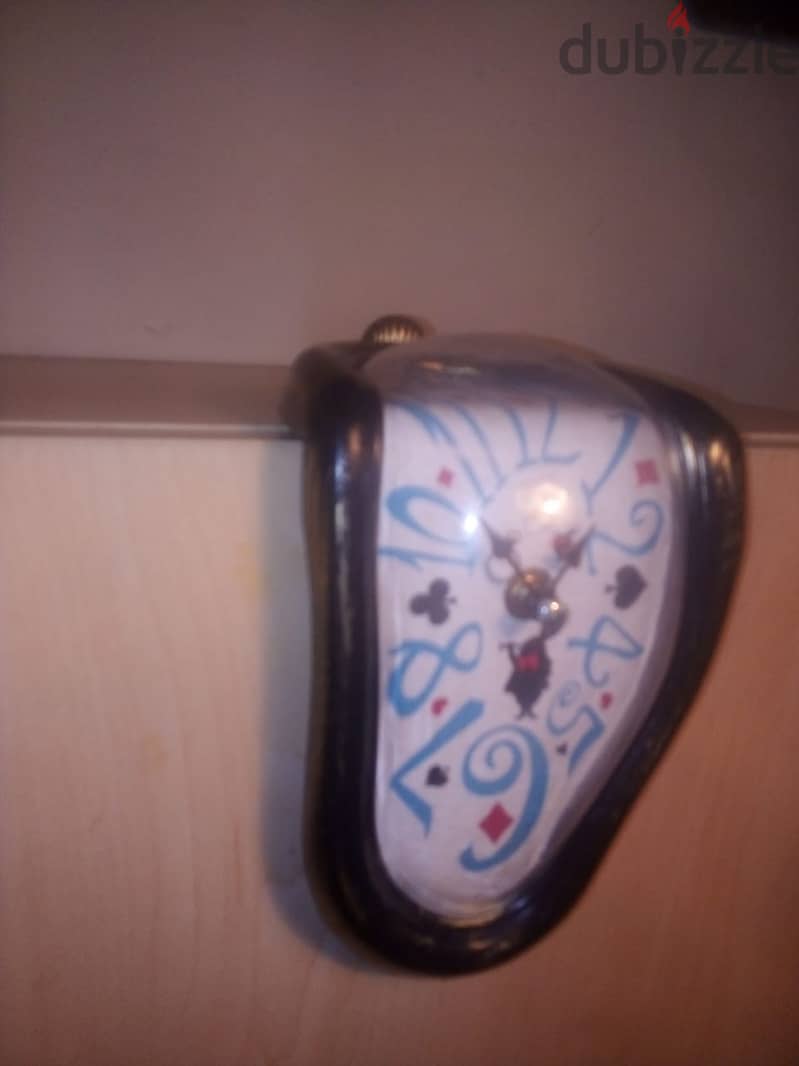 Melting clock inspired by the art of Salvador Dali. decorative clock 1