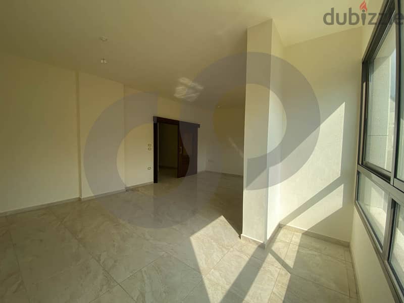REF#HE96891 Own this spacious apartment in the heart of Al Dahia! 1