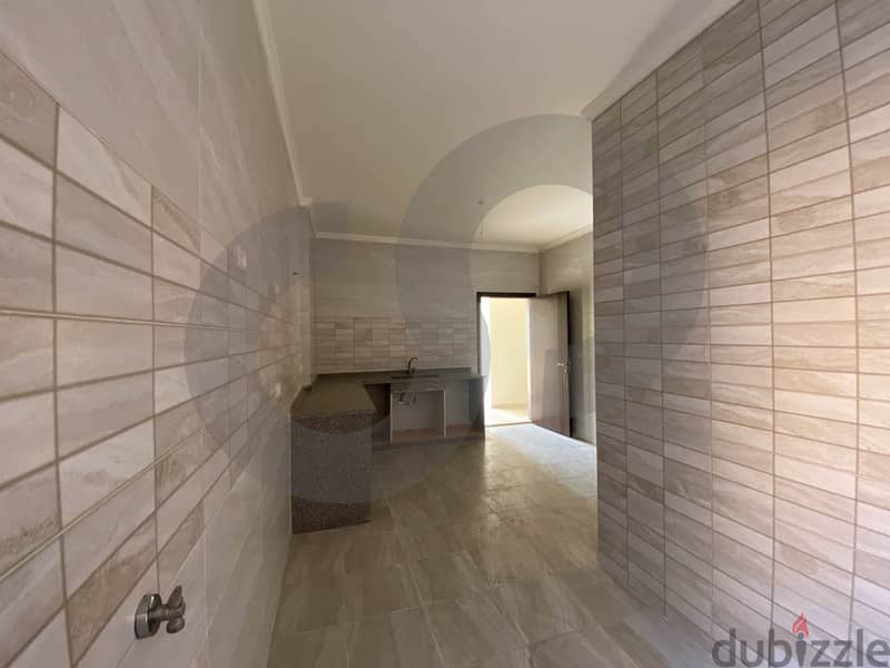 REF#HE96891 Own this spacious apartment in the heart of Al Dahia! 2