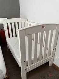 Baby - Toddler white bed/crib + 2 mattresses + floor drawer storage 1