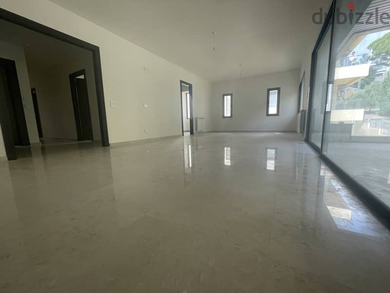 RWK144JS -  Apartment For Sale In Ballouneh - شقة للبيع في بلونة 0