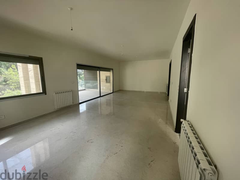 RWK144JS -  Apartment For Sale In Ballouneh - شقة للبيع في بلونة 2