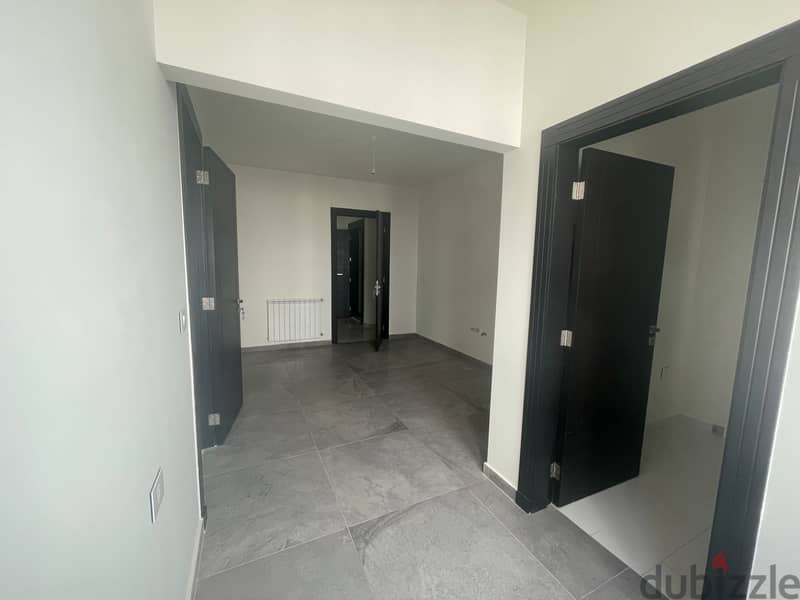 RWK144JS -  Apartment For Sale In Ballouneh - شقة للبيع في بلونة 3