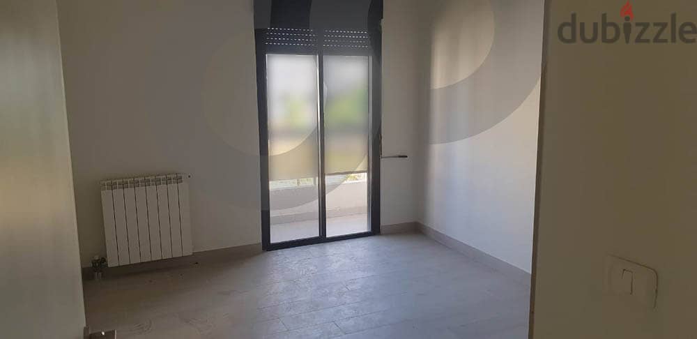A 145 SQM apartment for sale in BEIT EL CHAAR REF#ZA97293 8