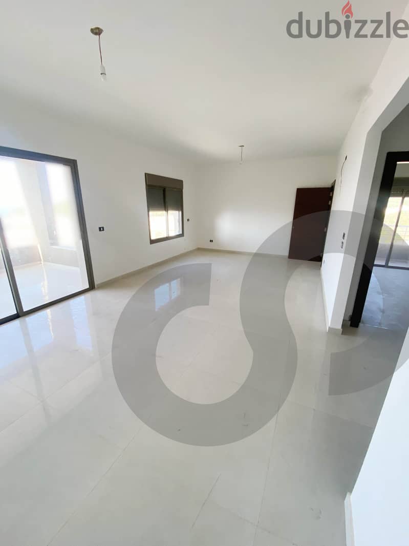 apartment for sale in calm area in kfaraabida batroun   REF#NE97313 1