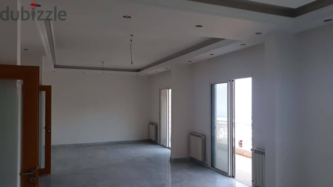 L04976 - Spacious Apartment For Sale in Qornet El Hamra with View 2