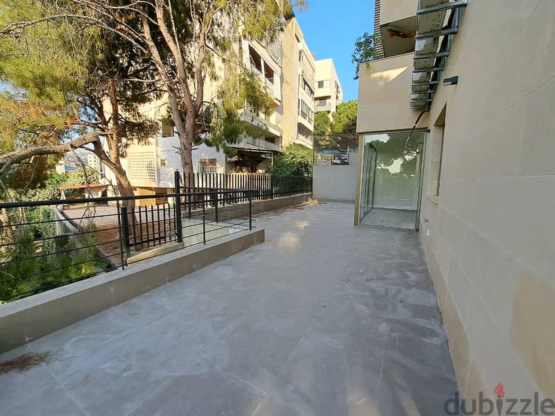 L13560-Apartment For Sale In Fanar with Terrace and Garden 1