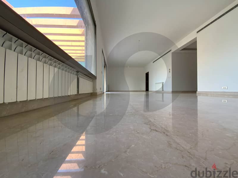 This spacious, well-lit apartment in Horsh Tabet   REF#SB97412 3
