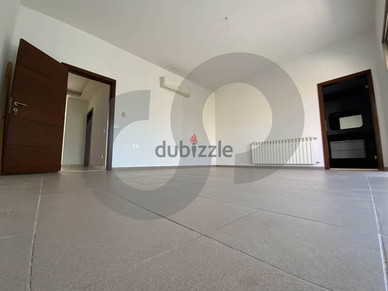 This spacious, well-lit apartment in Horsh Tabet   REF#SB97412 4