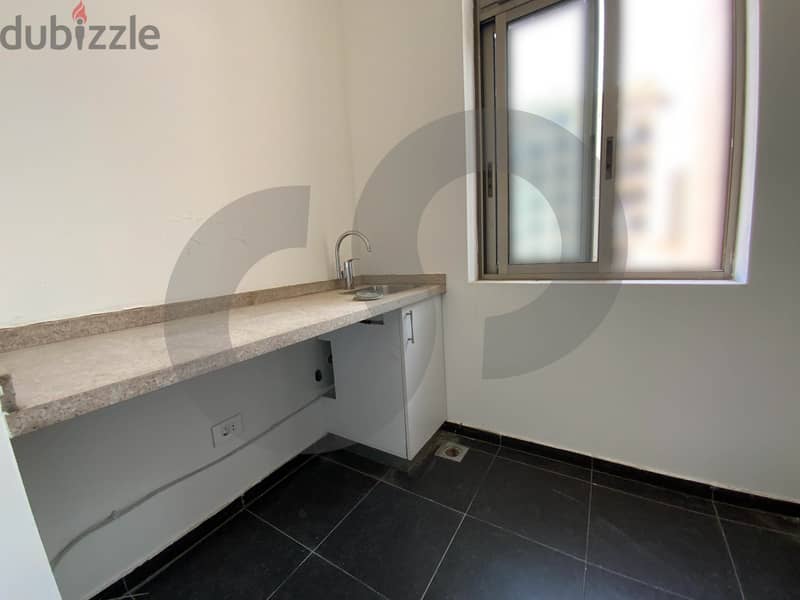 This spacious, well-lit apartment in Horsh Tabet   REF#SB97412 6