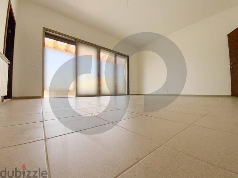 This spacious, well-lit apartment in Horsh Tabet   REF#SB97412 7