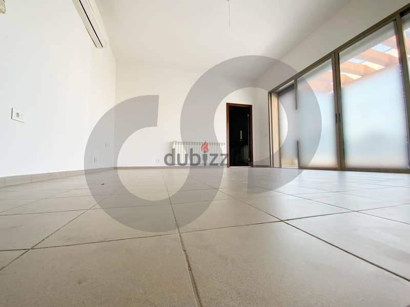 This spacious, well-lit apartment in Horsh Tabet   REF#SB97412 10