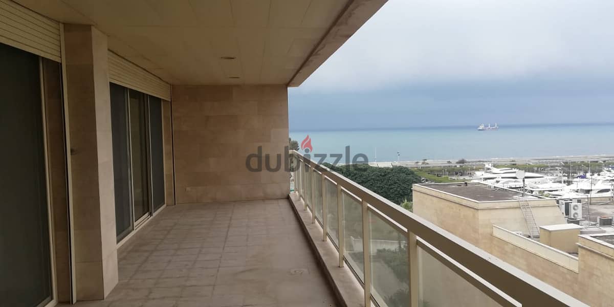 L06459 - Spacious Apartment for Sale in La Marina Dbayeh With An Open 3