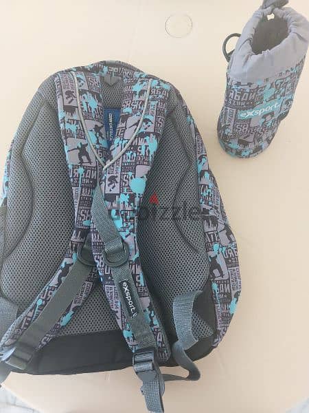eXsport  blue and grey school bag with matching water bottle cover 1