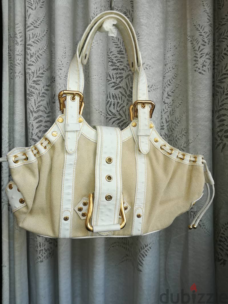Luxury : Louis Vuitton Cream bag 0
