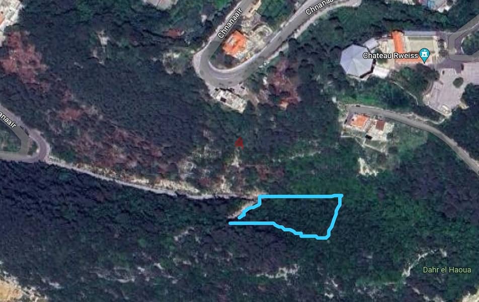 A 6600 m2 land having an open mountain/sea view for sale in Chnaniir 1
