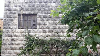 L03369 - Individual House For Sale in Mazraat Yachouh with a small lan