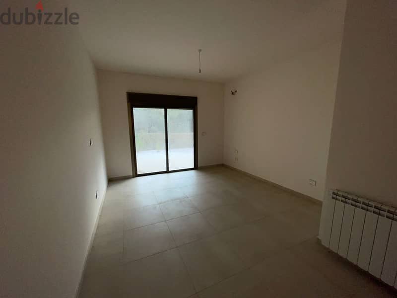 RWK140JS - Apartment For Sale in Ballouneh شقة للبيع في  بلونة 2