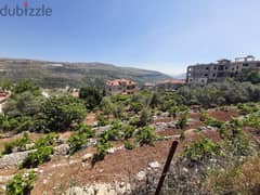 A 5500 m2 land having an open mountain view for sale in Aley