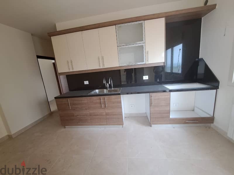 L13648-Brand New Apartment With Large Terrace for Sale In Jbeil 3