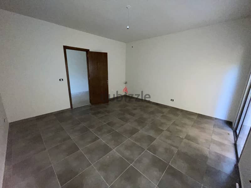 RWK163JS - Apartment For Sale In Ballouneh - شقة للبيع في بلونة 3