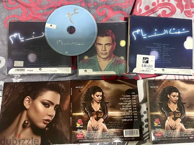 ٢ سي دي عمرودياب وقمر اصلي التنين ب ٥ $ CD 0