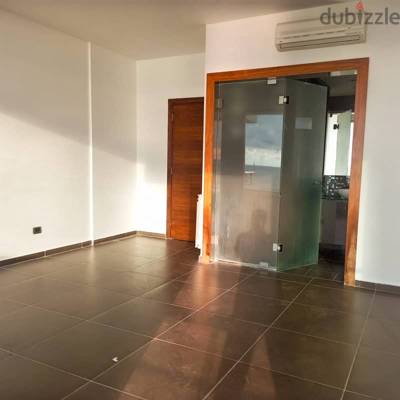 A 250 m2 apartment having an open sea view for sale in Dbaye 9