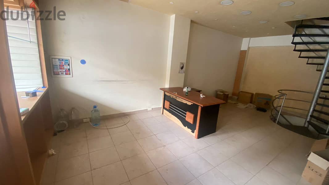 L13802-Shop With Mezanine for Rent In A Good Location In Jal El Dib 1