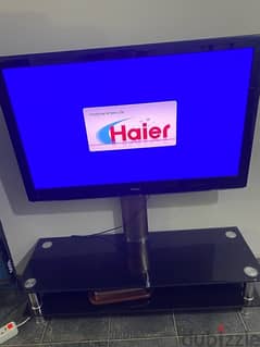 haier tv 46 inches with glass stand in good condition