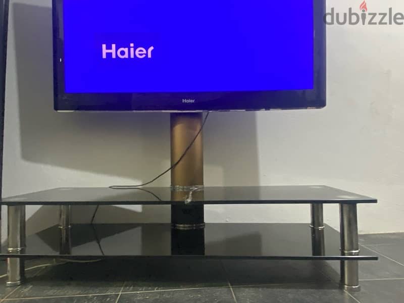 haier tv 46 inches with glass stand in good condition 1