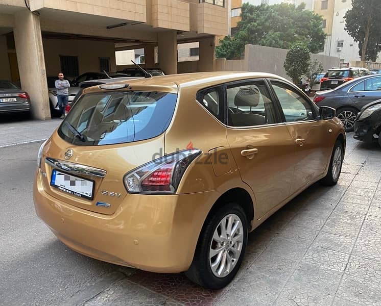 Nissan Tiida 2014 sv 1.8 السعر يشمل آلتسجيل 4