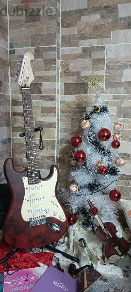 electric guitar with bag and cable and picks free 4