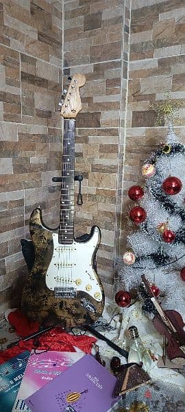 electric guitar with bag and cable and picks free 6