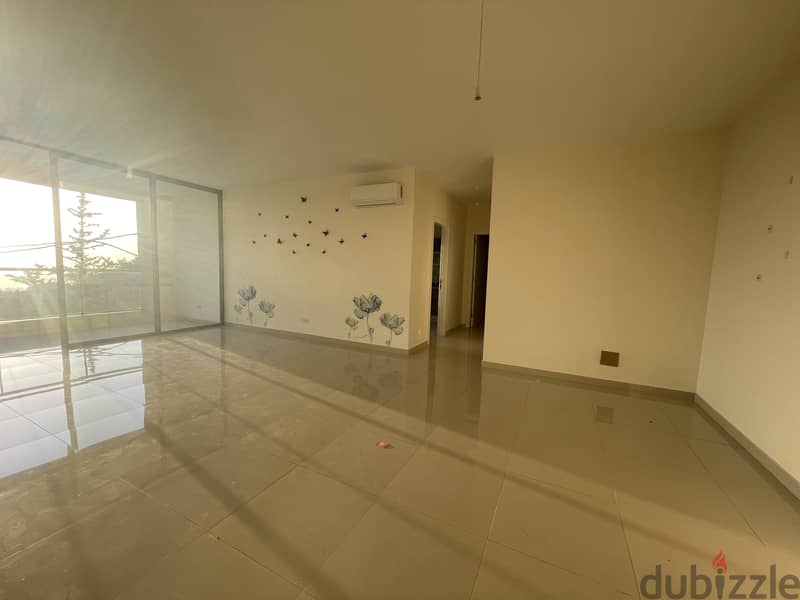 RWK169JS - Apartment For Rent in Ballouneh - شقة للإيجار في بلونة 1