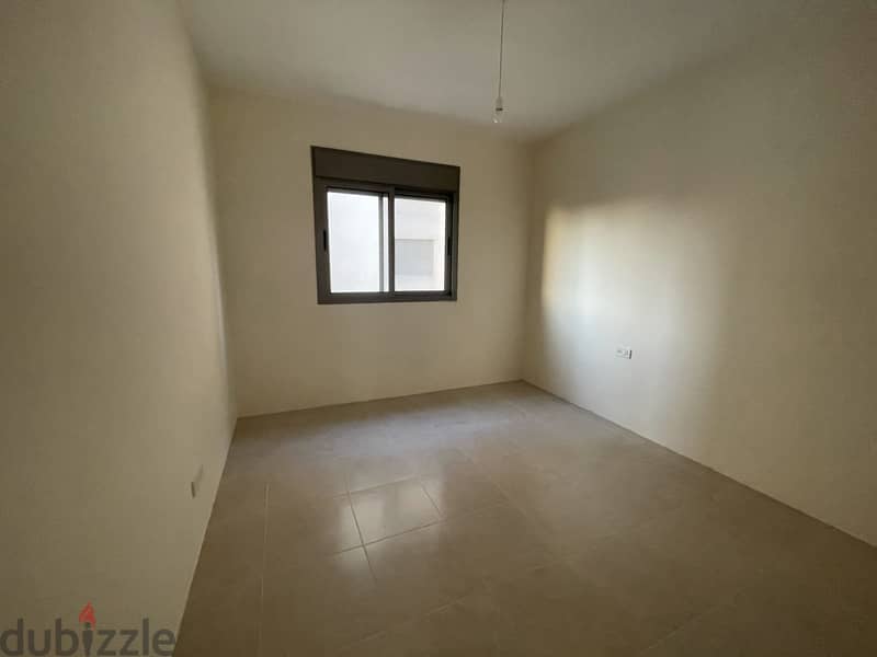 RWK169JS - Apartment For Rent in Ballouneh - شقة للإيجار في بلونة 2