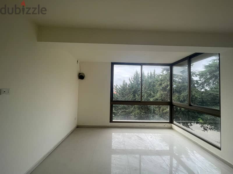 RWK170JS - Apartment For Sale in Ballouneh - شقة للبيع في بلونة 1