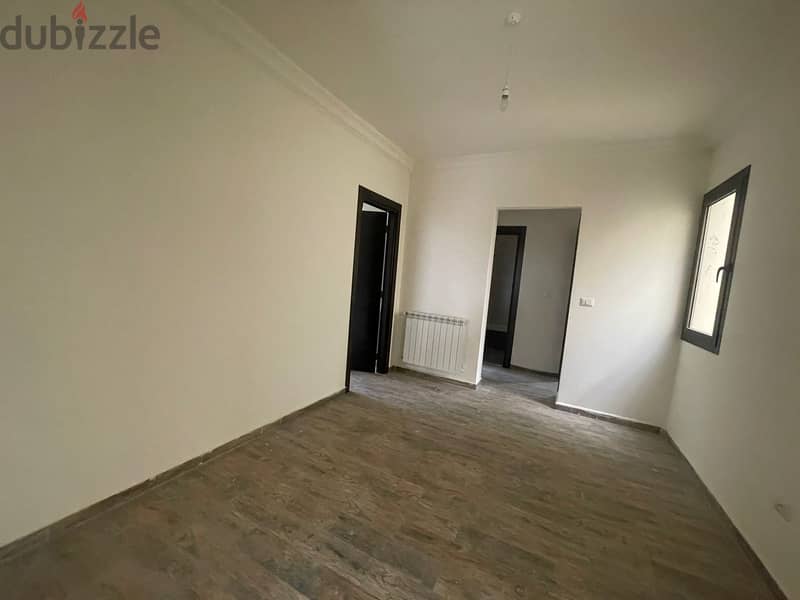 RWK170JS - Apartment For Sale in Ballouneh - شقة للبيع في بلونة 8