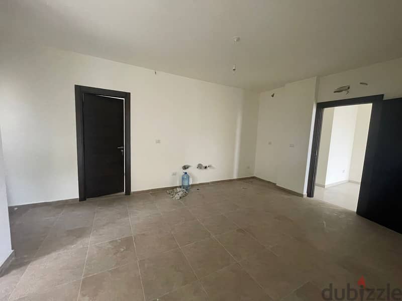 RWK170JS - Apartment For Sale in Ballouneh - شقة للبيع في بلونة 9