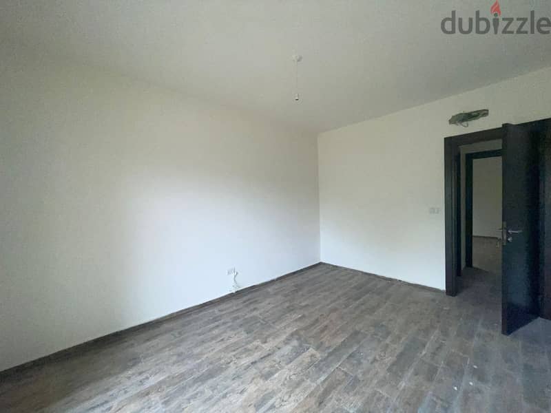 RWK170JS - Apartment For Sale in Ballouneh - شقة للبيع في بلونة 10