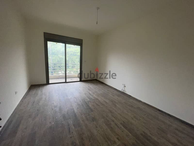RWK170JS - Apartment For Sale in Ballouneh - شقة للبيع في بلونة 11