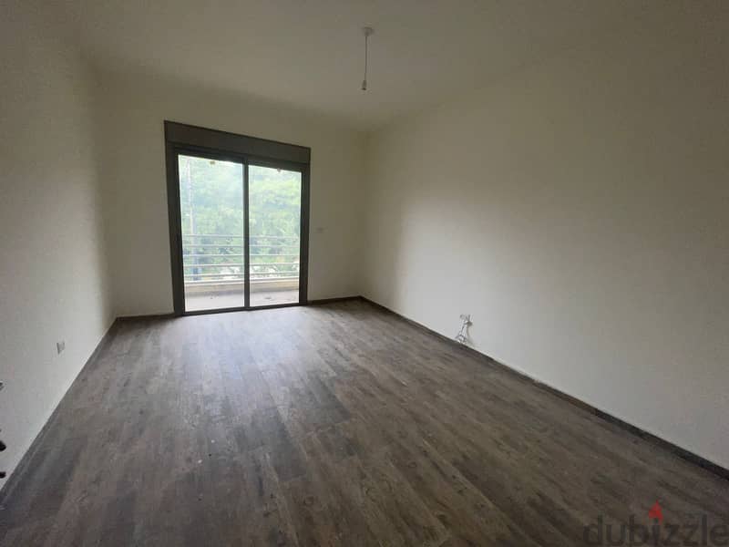 RWK170JS - Apartment For Sale in Ballouneh - شقة للبيع في بلونة 12