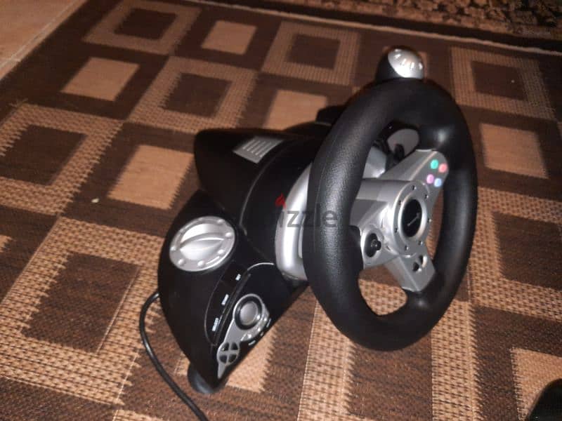steering wheel for ps2xbox and pc  like new 1