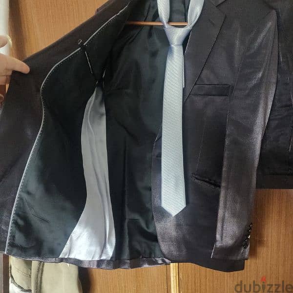 a suit used for one time only with its tie made in turkey 3