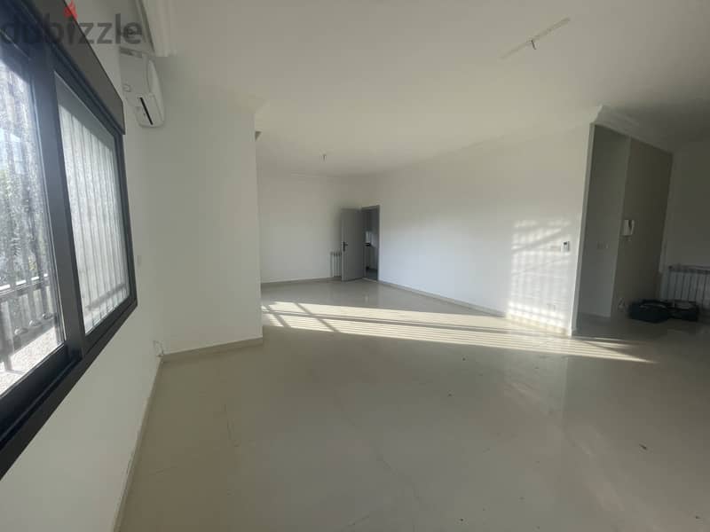 RWK174JS - Apartment For Sale In Ballouneh - شقة للبيع في بلونة 1