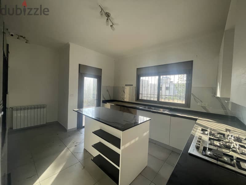 RWK174JS - Apartment For Sale In Ballouneh - شقة للبيع في بلونة 3