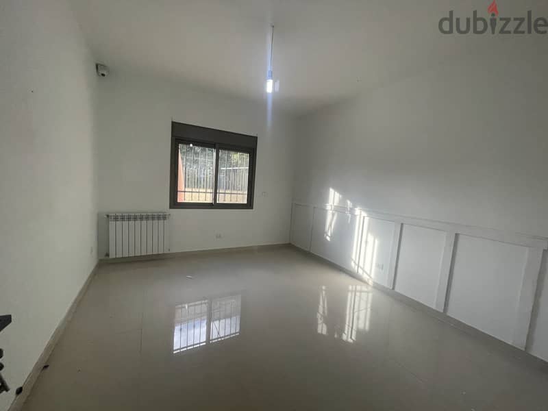 RWK174JS - Apartment For Sale In Ballouneh - شقة للبيع في بلونة 8