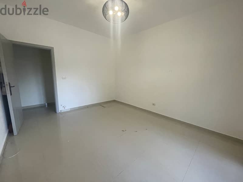 RWK174JS - Apartment For Sale In Ballouneh - شقة للبيع في بلونة 10