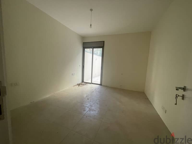 RWK176JS - Apartment For Sale in Ballouneh - شقة للبيع في بلونة 1
